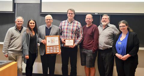 ward presentation ceremony. (Left to right)  Ed Conway (Director, CBR) Solmaz Sobhanifar (2015 winner) Roger Page (Michael’s father) Evan Haney (2016 winner) Leonard Foster (Head, Biochemistry & Molecular Biology) Ross MacGillivray (Michael’s graduate supervisor) Sarah Henderson (Faculty of Graduate and Postdoctoral Studies)