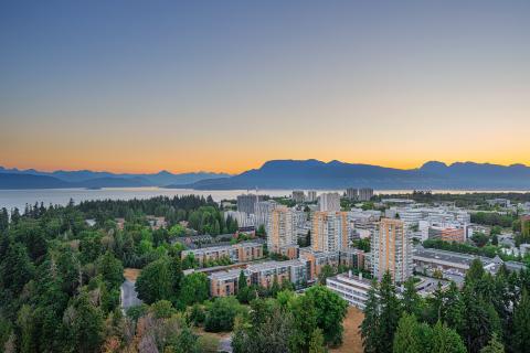 campus buildings with the mountains int eh background